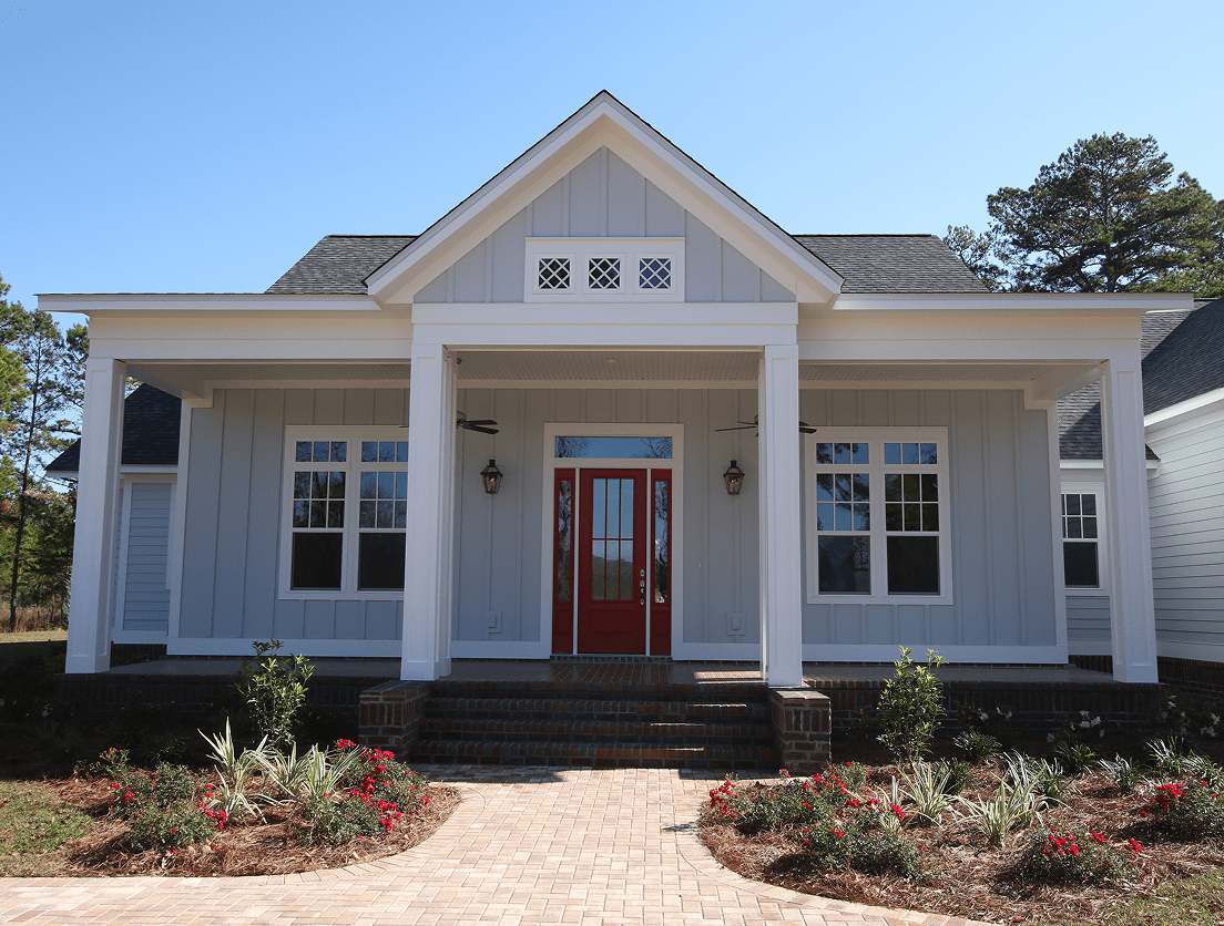 Modern gray house with red door
