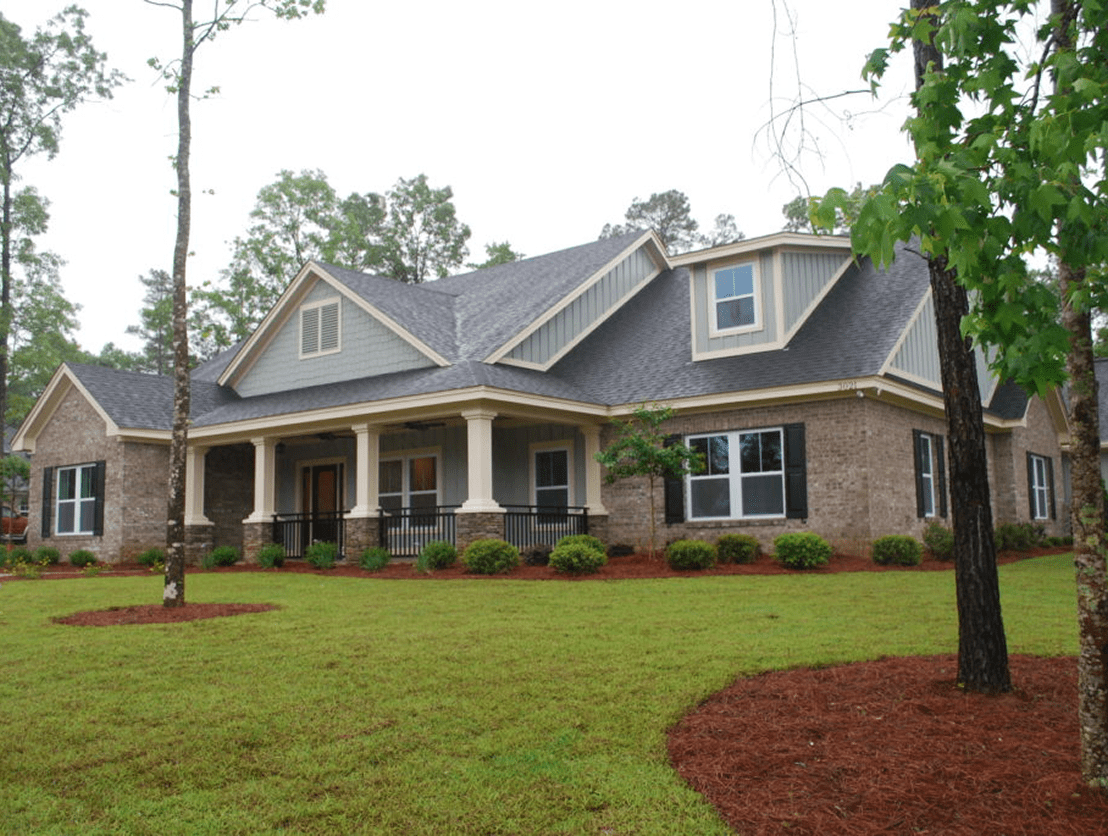 Spacious suburban home with green lawn
